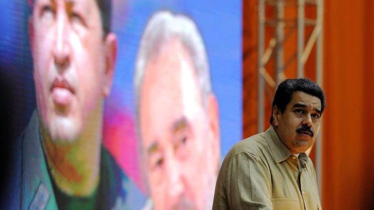 Maduro imagen Chavez y Fidel Infobae