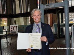 julio-showing-boston-certificate